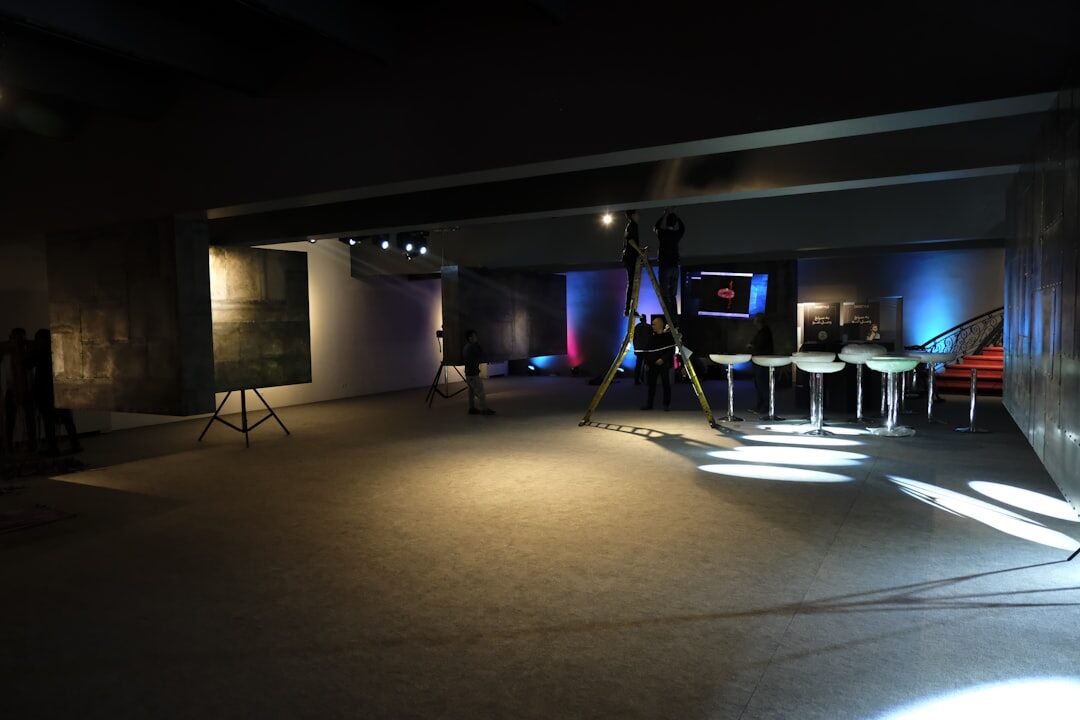 Wide interior view of a professional television production studio