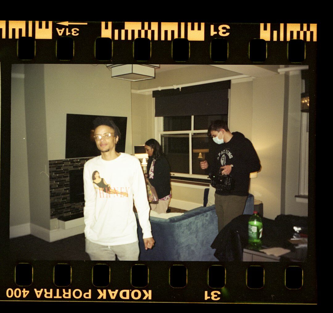 Diverse television production team standing together in a studio
