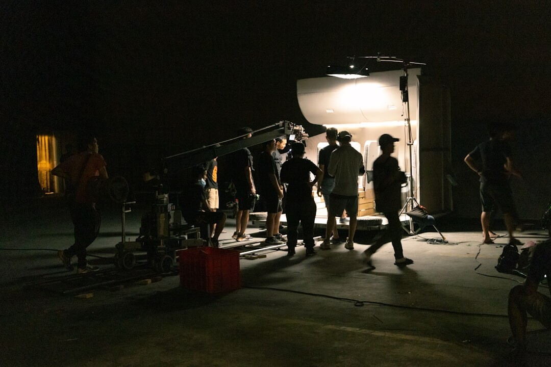 Behind the scenes view of a busy television studio floor