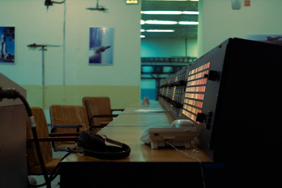 Broadcast control room with multiple video monitors and switchers