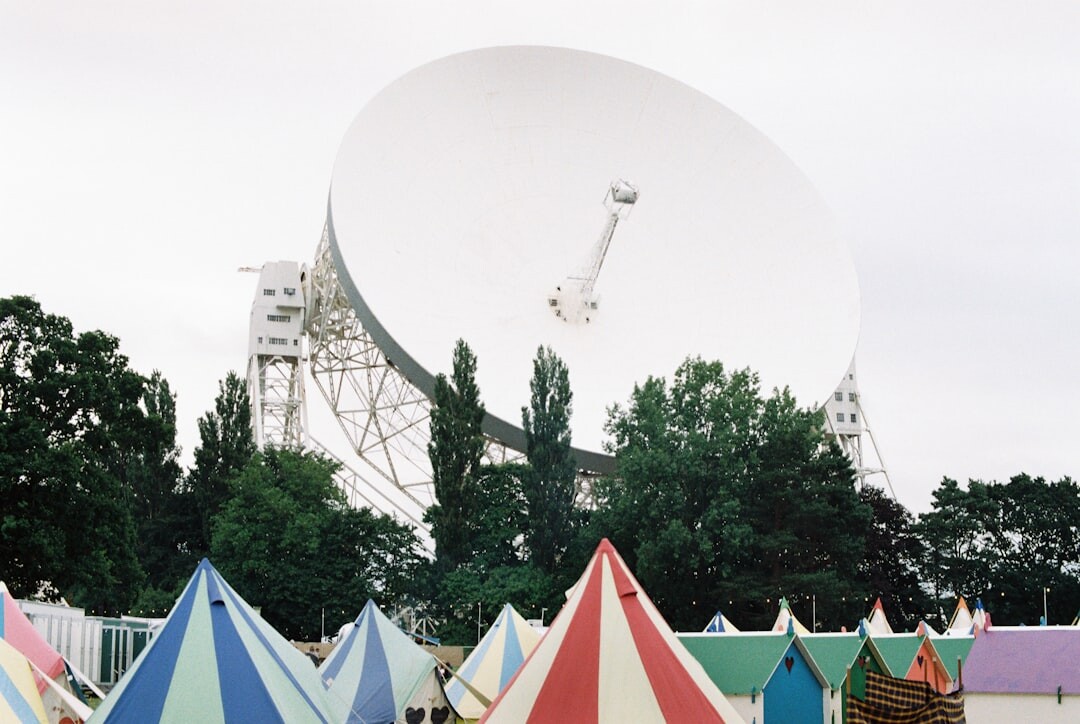 Outside broadcast truck with satellite dish at an event